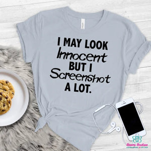 I may look innocent, but I screenshot a lot T-shirt
